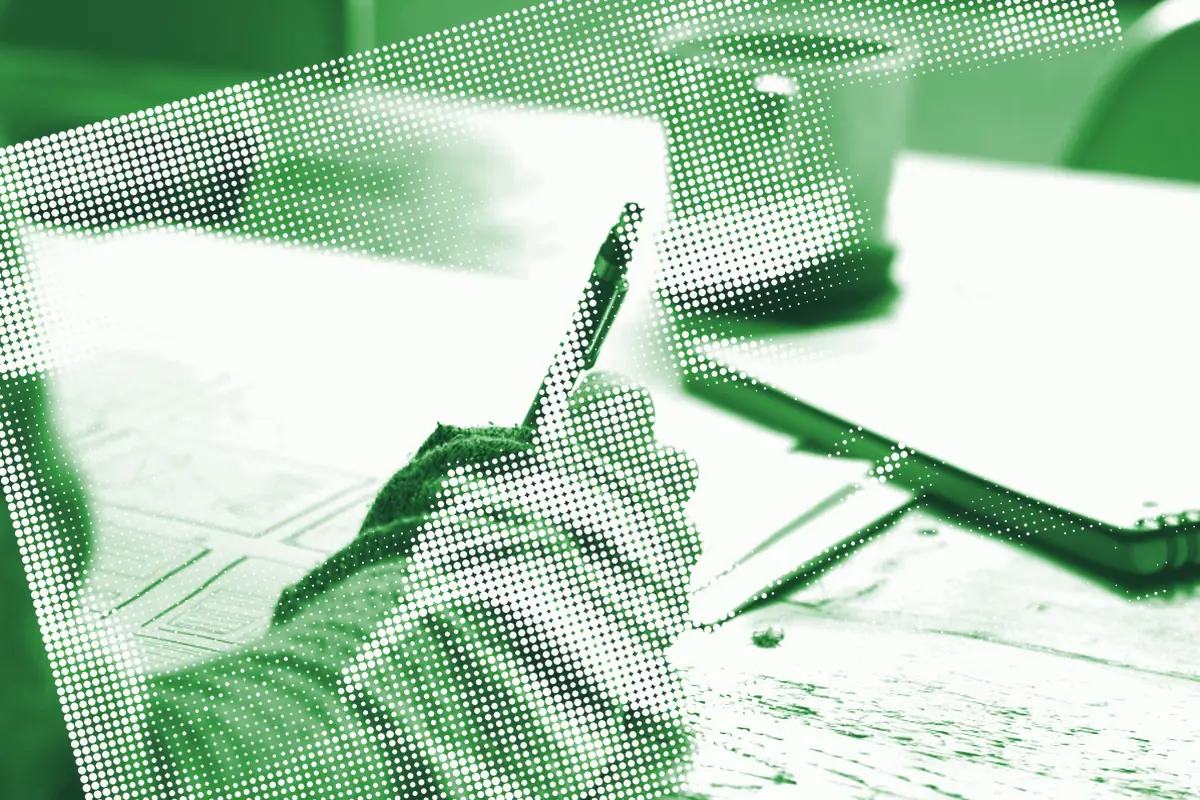 A hand writing in a ledger — metered usage being settled.